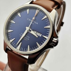 luxury watch with blue bay and brown leather strap